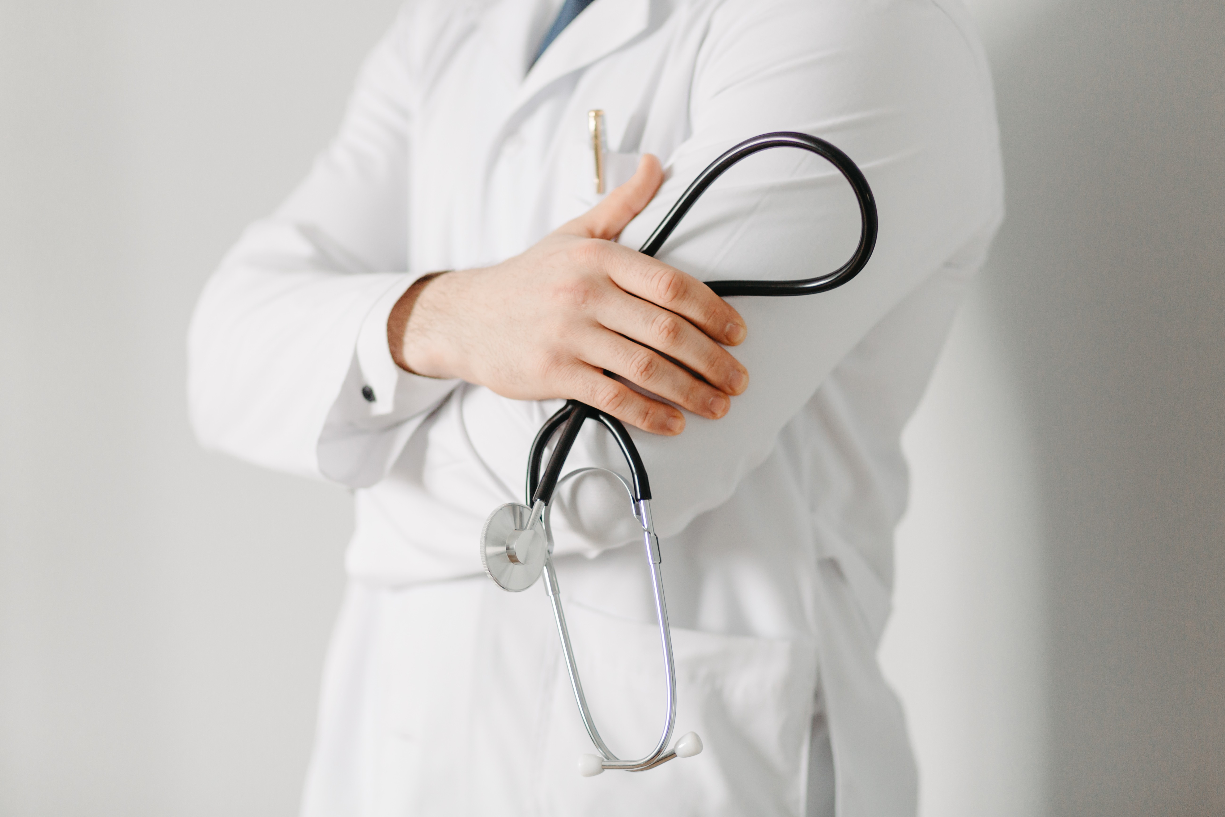portrait-friendly-doctor-isolated-gray.jpg